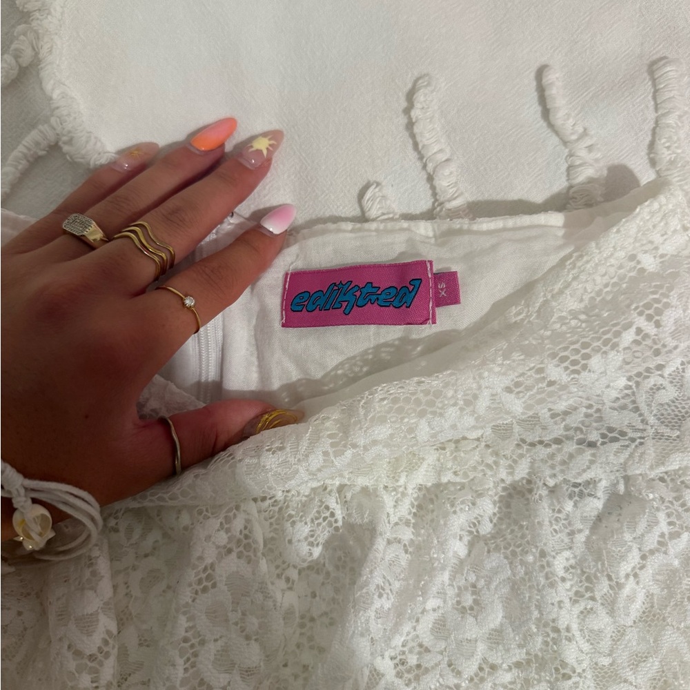 EDIKTED Ruffle Sheer Lace Low Rise Mini Skirt